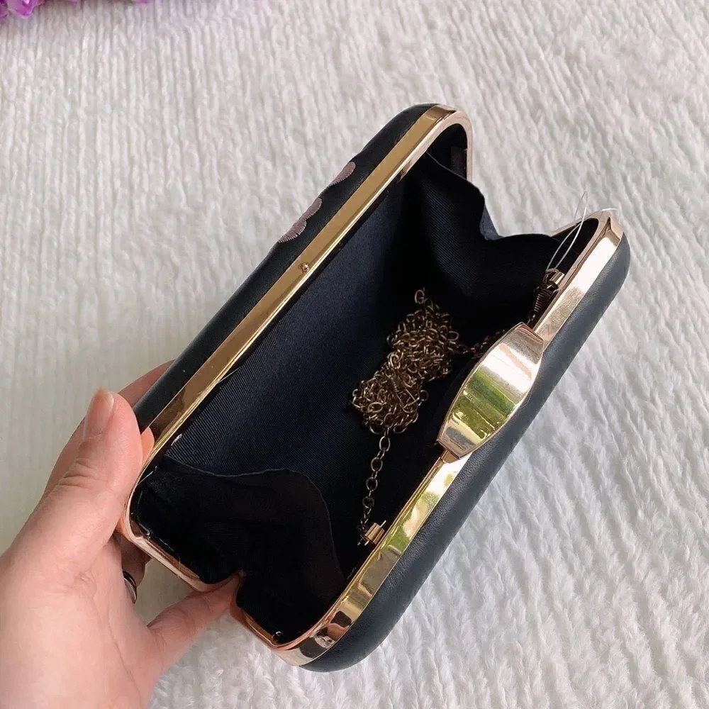 Vintage style floral embroidery boxy clutch